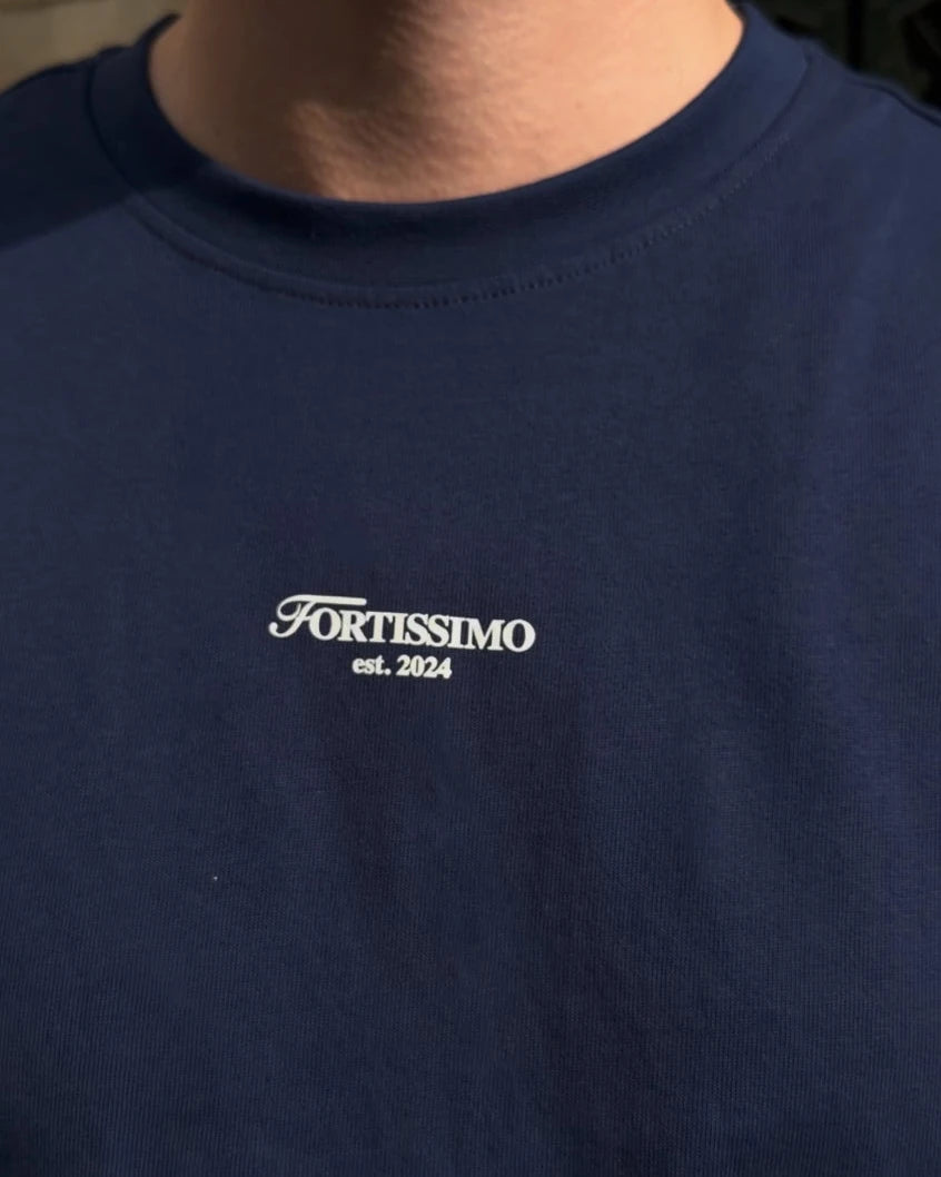 Navy blue t-shirt with 'Fortissimo est. 2024' logo on a plain background